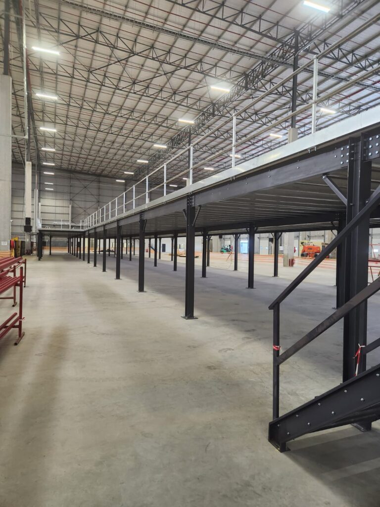 Newly installed mezzanine floor in large fashion retail warehouse.