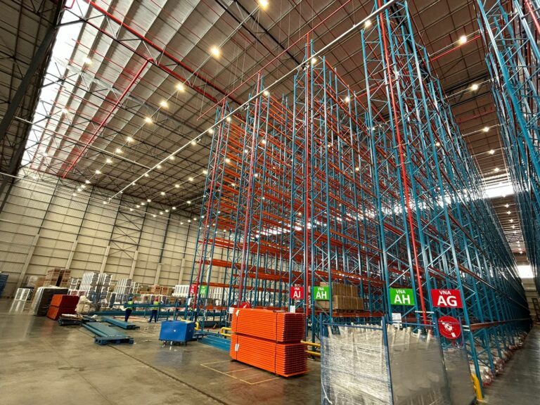 Very Narrow Aisle Racking Orange and Blue far side view finished